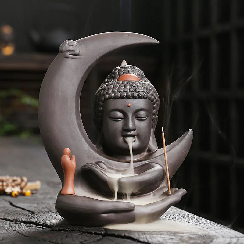 Incensário de cerâmica com figura de Buda e lua, com design zen para uso decorativo e aromático em ambientes de meditação, casa ou estúdio