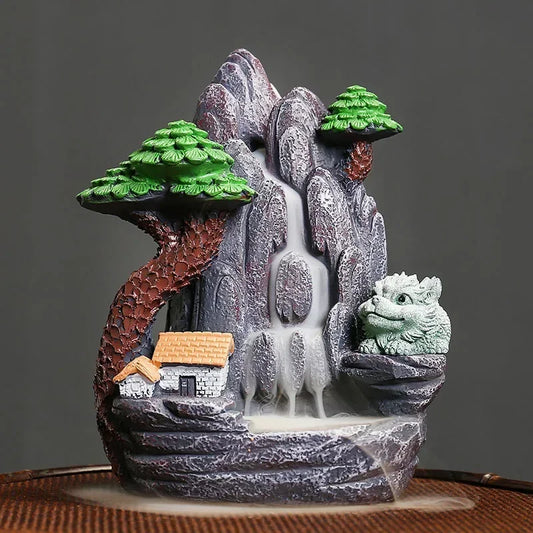 Incensário cascata de cerâmica  e efeito de fumaça reversa, usado para criar um ambiente de paz e meditação.